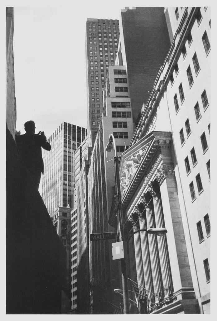 Man Photographing New York Stock Exchange from Federal Hall